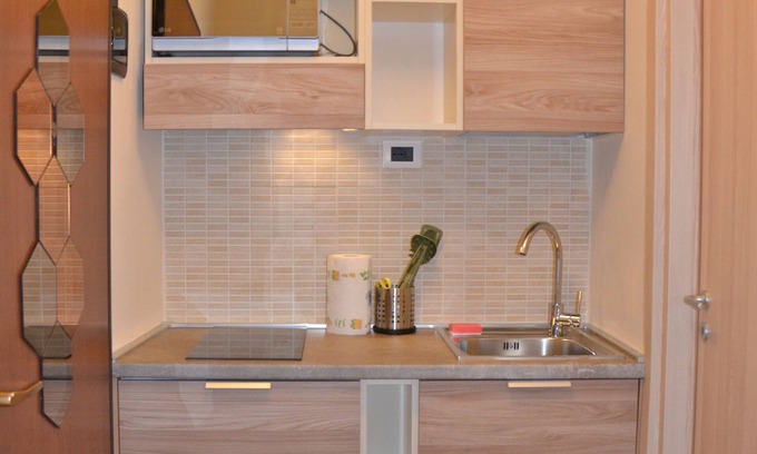 San Donato Apartment | Sage | Short-term rental apartment for temporary use