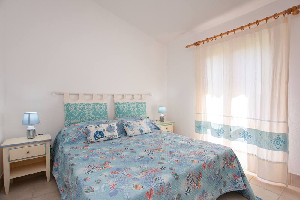 Photo of Bedroom in Capo Coda Cavallo