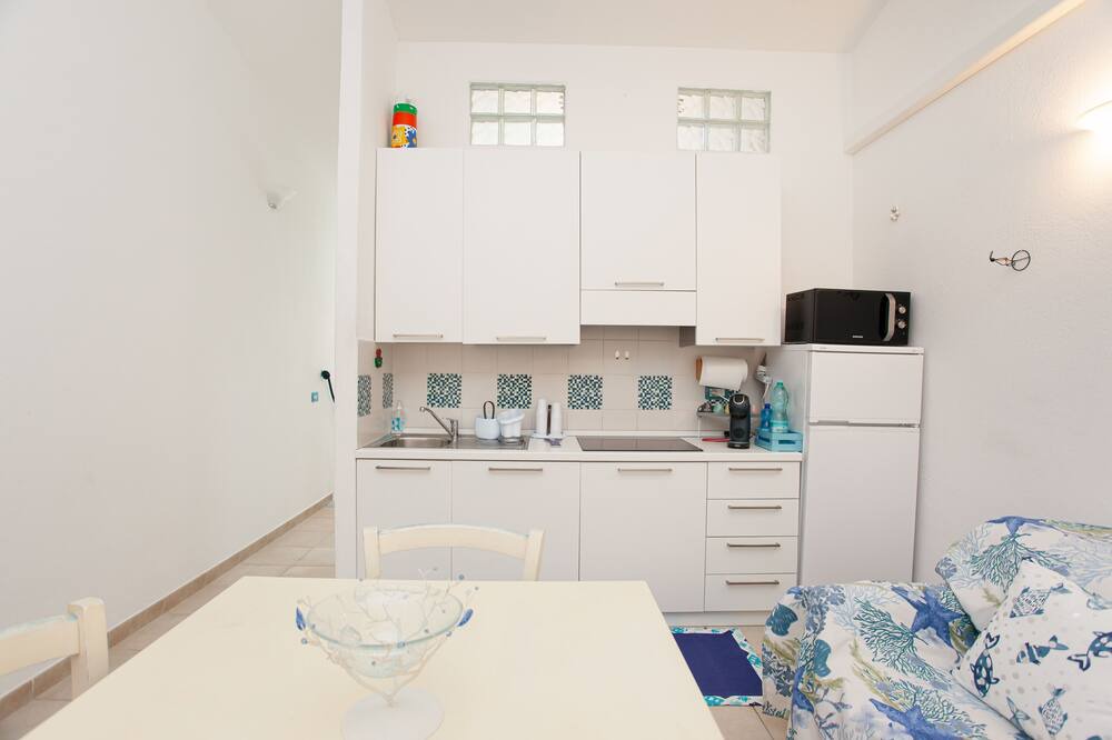 Photo of Kitchen in Capo Coda Cavallo