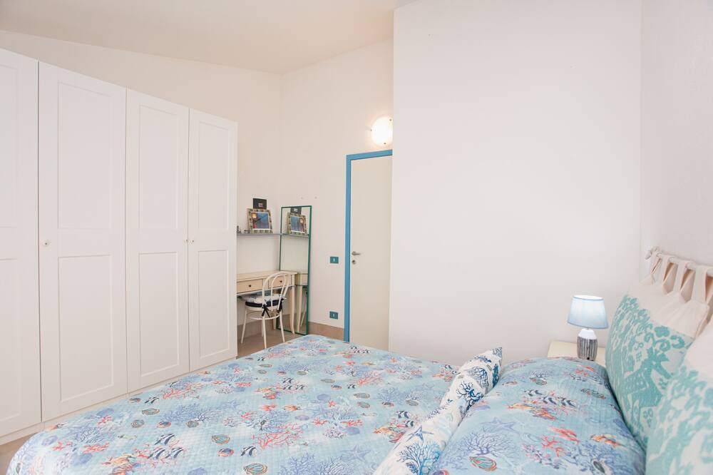 Photo of Bedroom in Capo Coda Cavallo