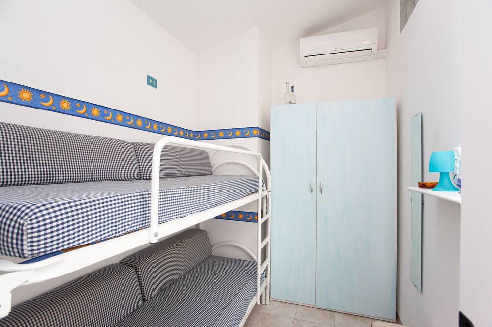 Photo of Bedroom in Capo Coda Cavallo