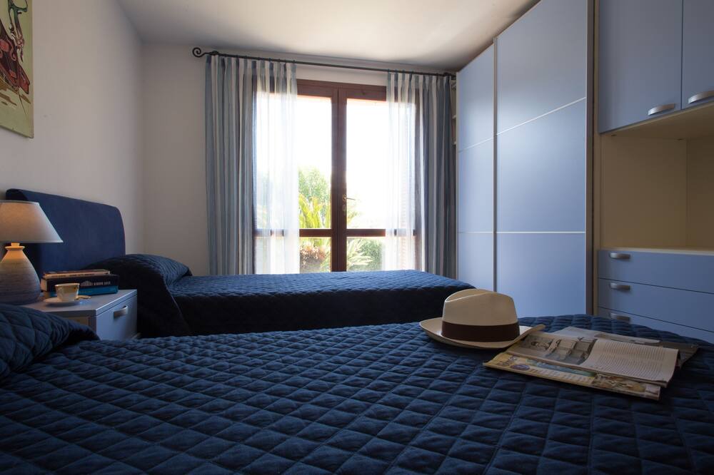 Photo of Bedroom in Capo Coda Cavallo