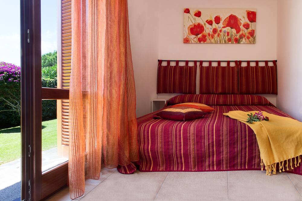 Photo of Bedroom in Capo Coda Cavallo