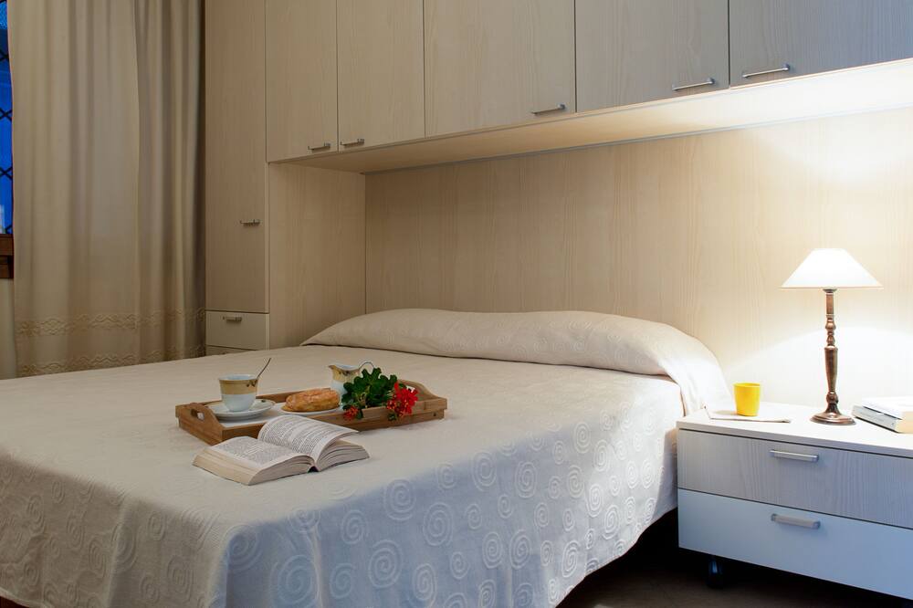 Photo of Bedroom in Capo Coda Cavallo