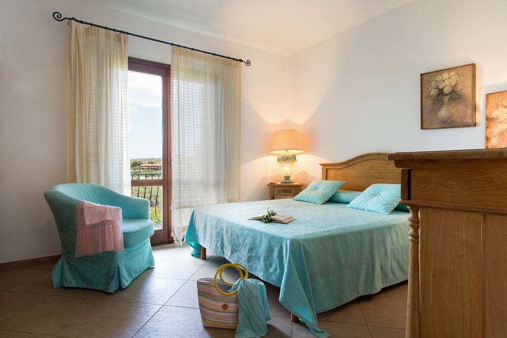 Photo of Bedroom in Capo Coda Cavallo