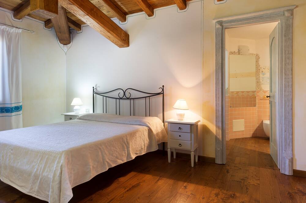Photo of Bedroom in Capo Coda Cavallo