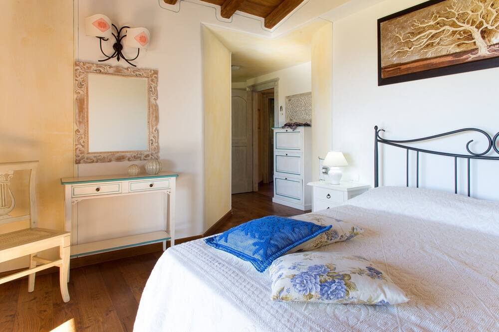 Photo of Bedroom in Capo Coda Cavallo