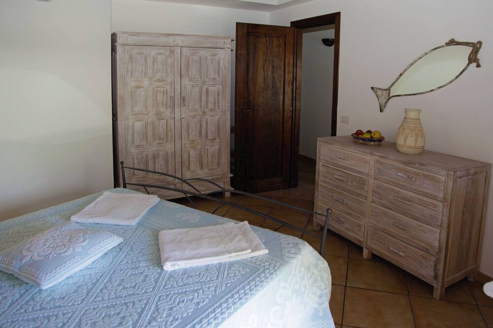 Photo of Bedroom in Capo Coda Cavallo