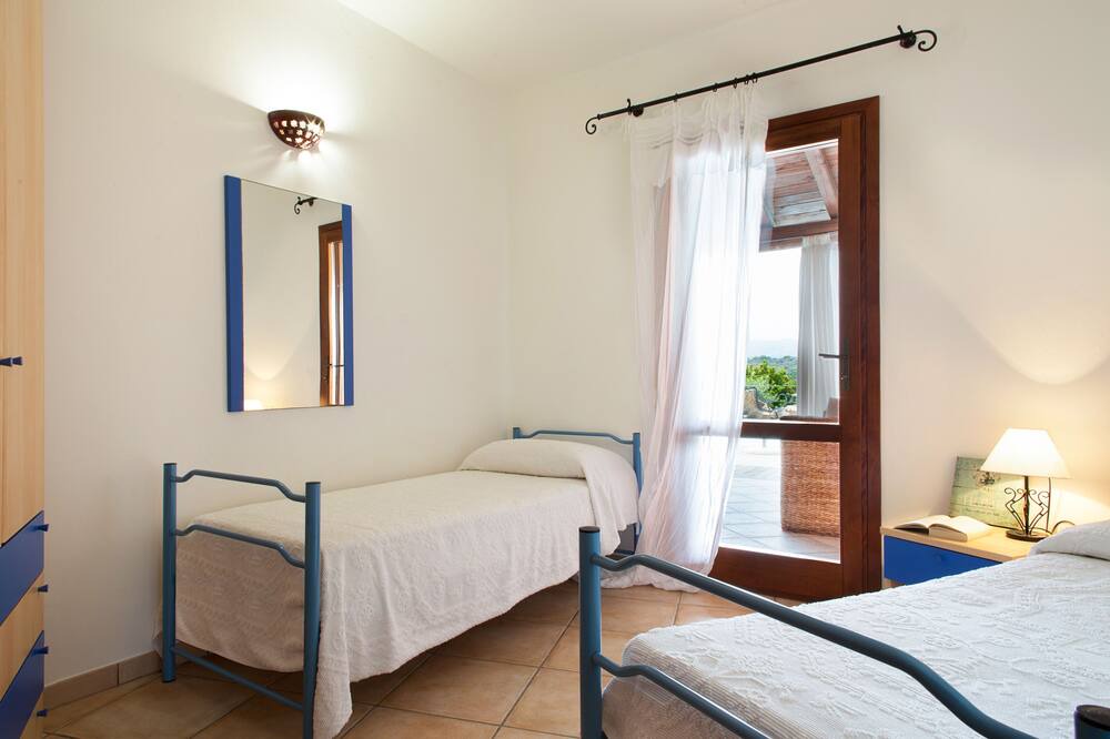 Photo of Bedroom in Capo Coda Cavallo