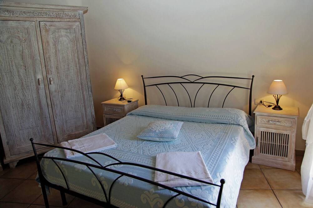 Photo of Bedroom in Capo Coda Cavallo