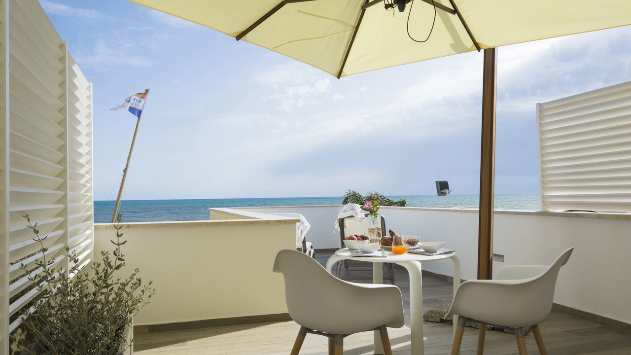 Photo of Bedroom in Lido di Capo Portiere