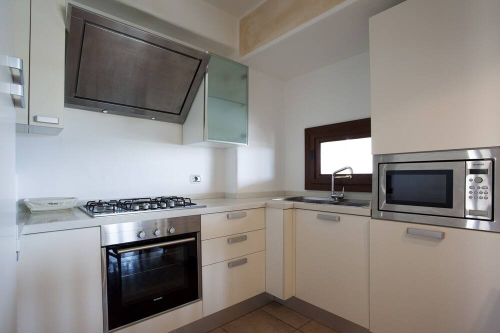Photo of Kitchen in Capo Coda Cavallo