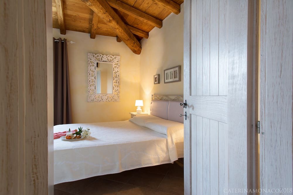 Photo of Bedroom in Capo Coda Cavallo