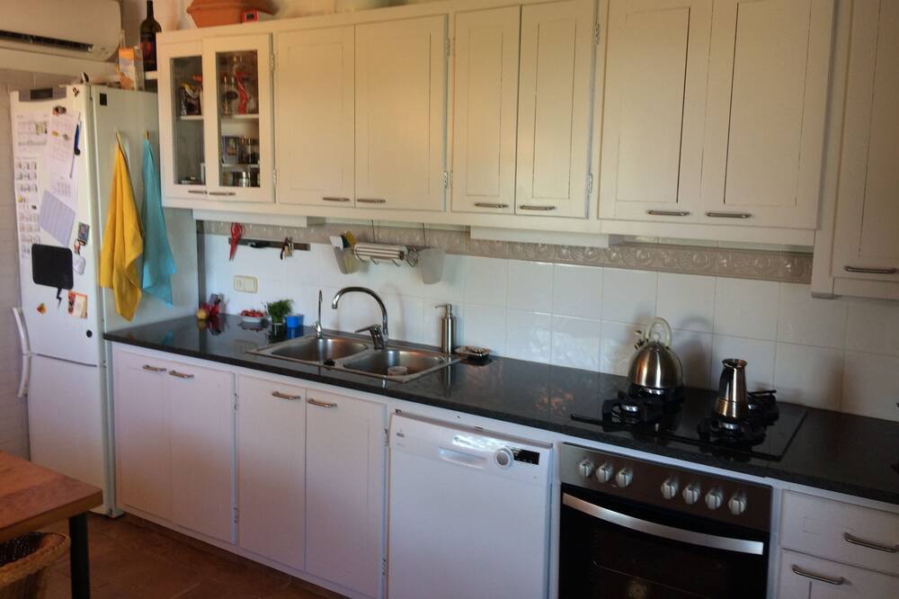 Photo of Kitchen in Llampaies