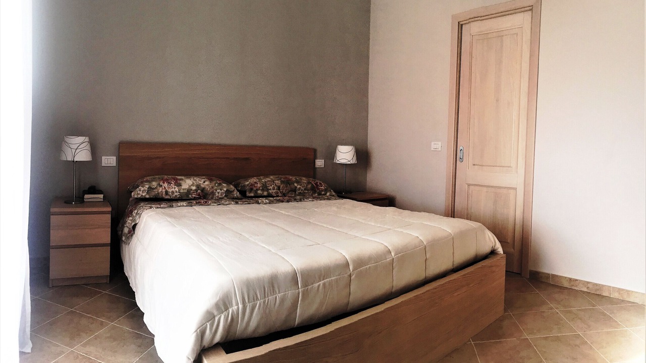 Photo of Bedroom in Case Peschiera-Lu Fraili