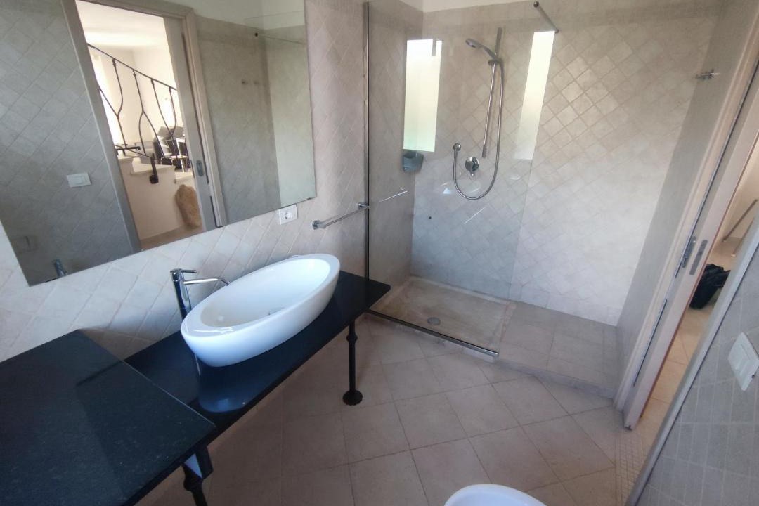 Photo of Bathroom in Case Peschiera-Lu Fraili