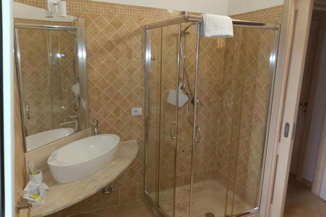 Photo of Bathroom in Case Peschiera-Lu Fraili