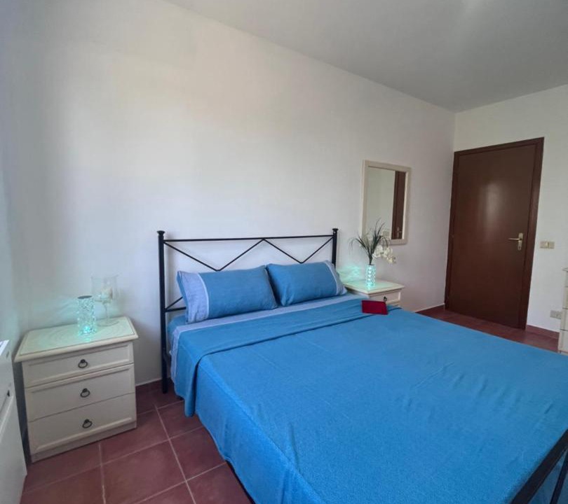 Photo of Bedroom in Lido di Capo Portiere