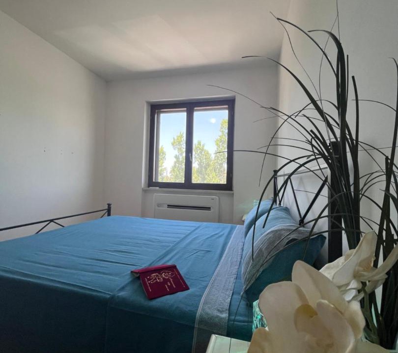 Photo of Bedroom in Lido di Capo Portiere