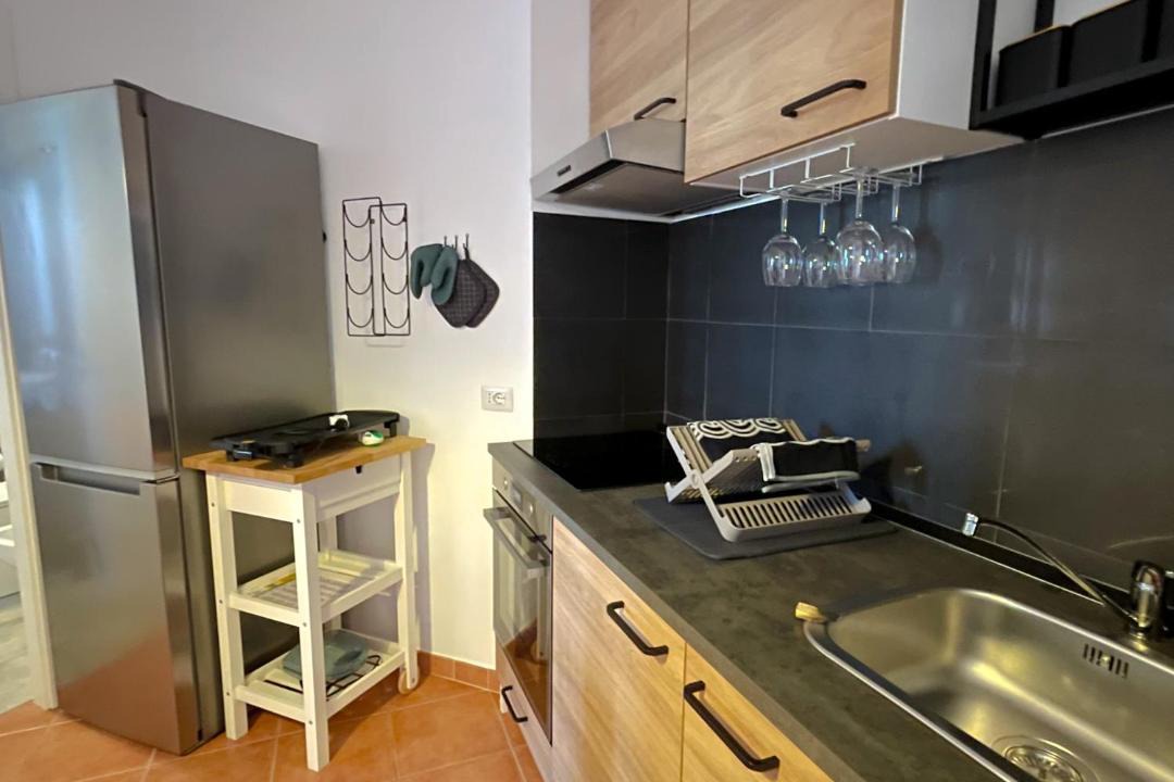 Photo of Kitchen in Lido di Capo Portiere