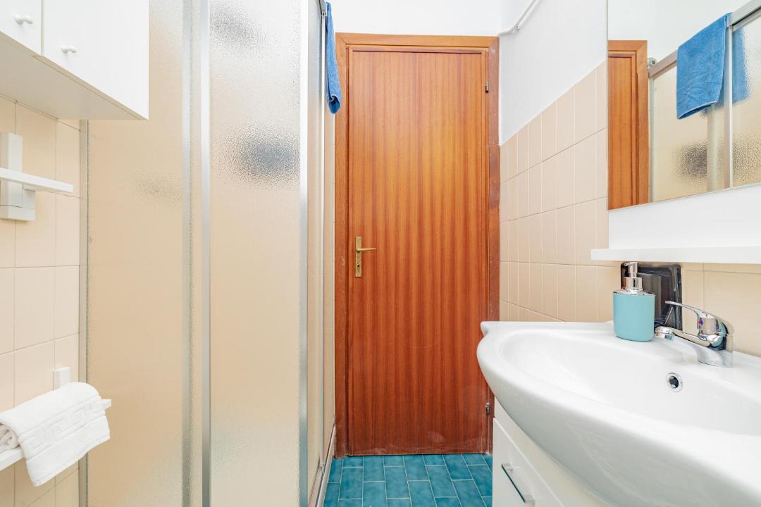 Photo of Bathroom in Capo Mimosa-Rollo
