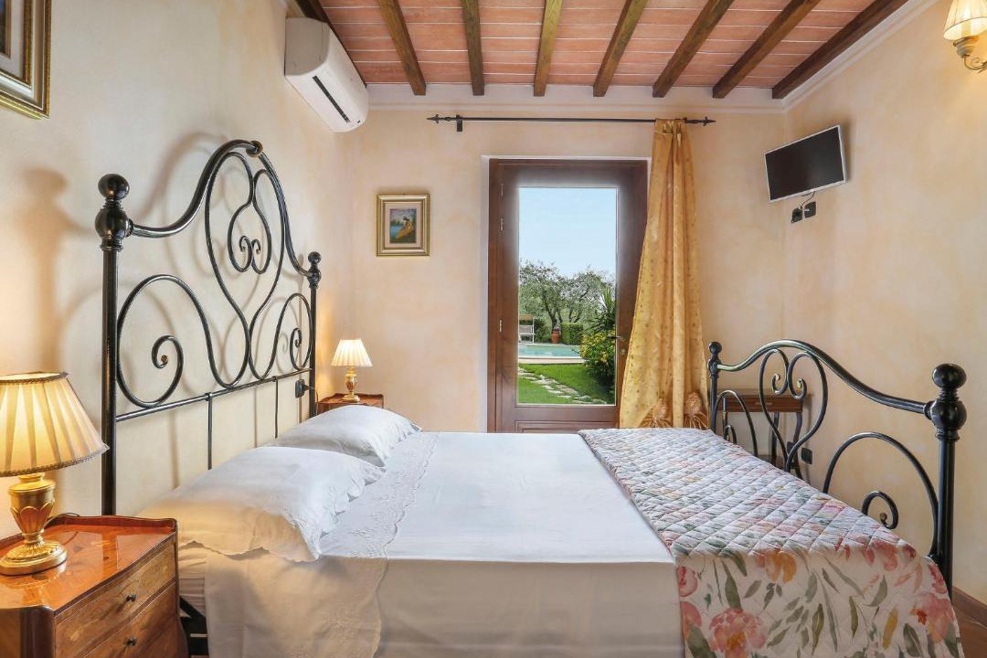 Photo of Bedroom in Margine Coperta-Traversagna