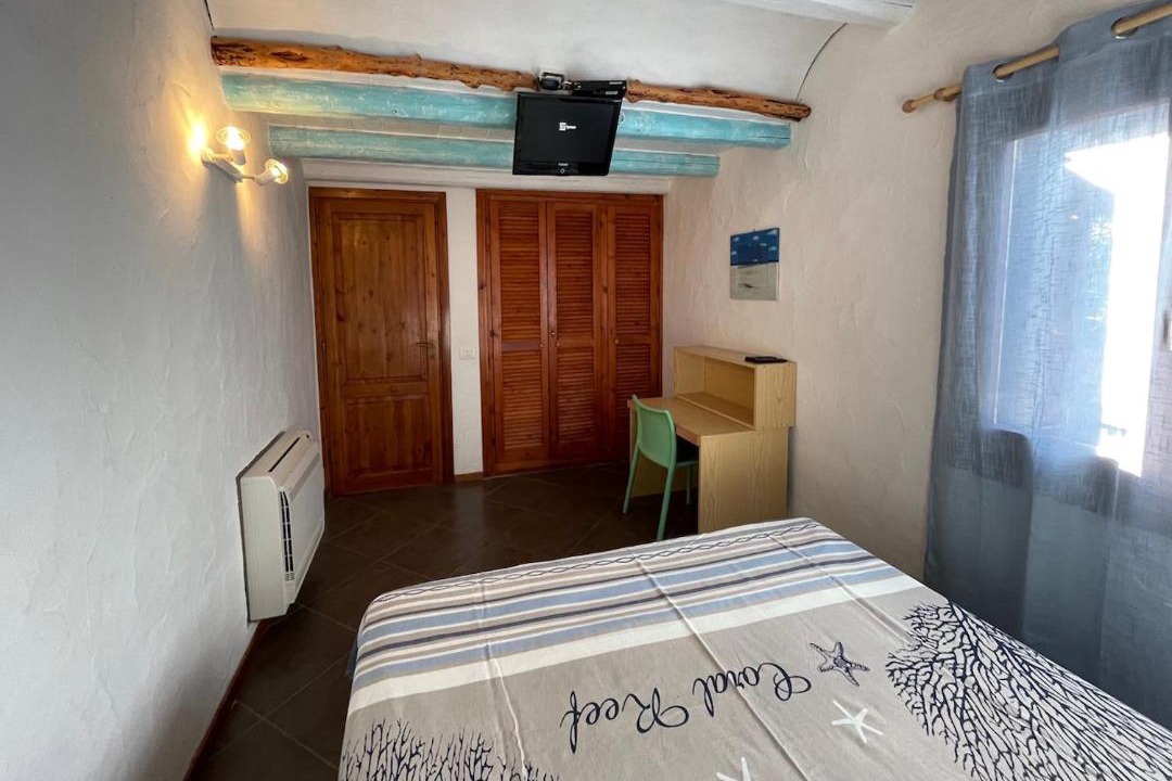 Photo of Bedroom in Capo Coda Cavallo