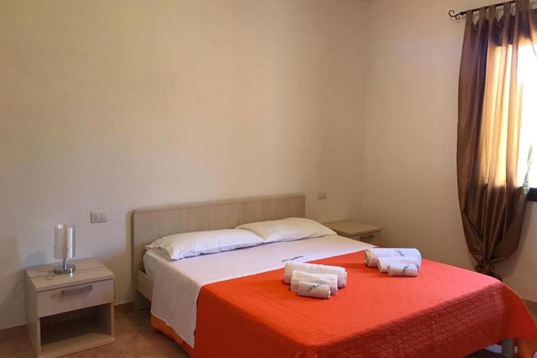 Photo of Bedroom in Case Peschiera-Lu Fraili
