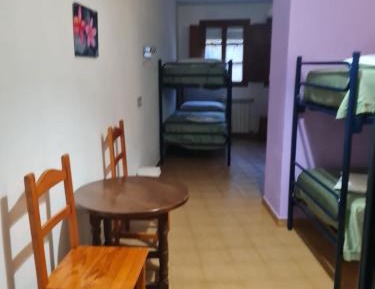 Single Bed in Dormitory Room