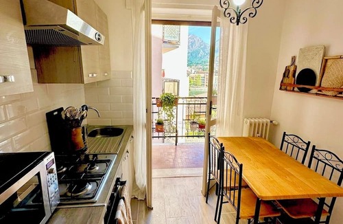 Malgrate Apartment | Cozy rustic apartment with candlelights & mountain/lake views!